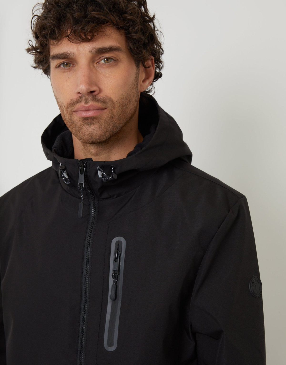 Showerproof Hooded Microfleece Lined Jacket in Black