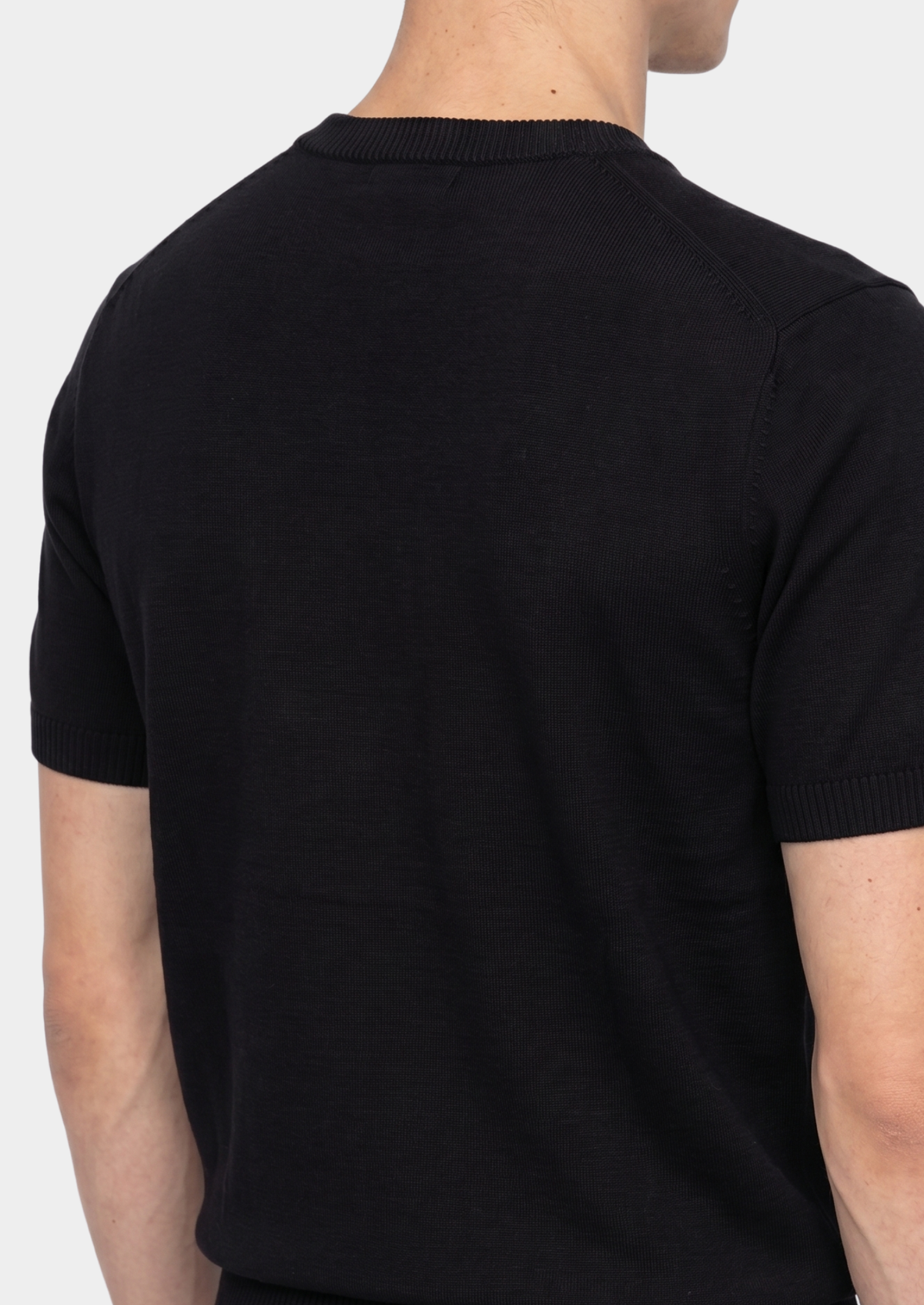 Essential Black Knitted Crew Neck T-Shirt by SATRI & CO. – product view 2