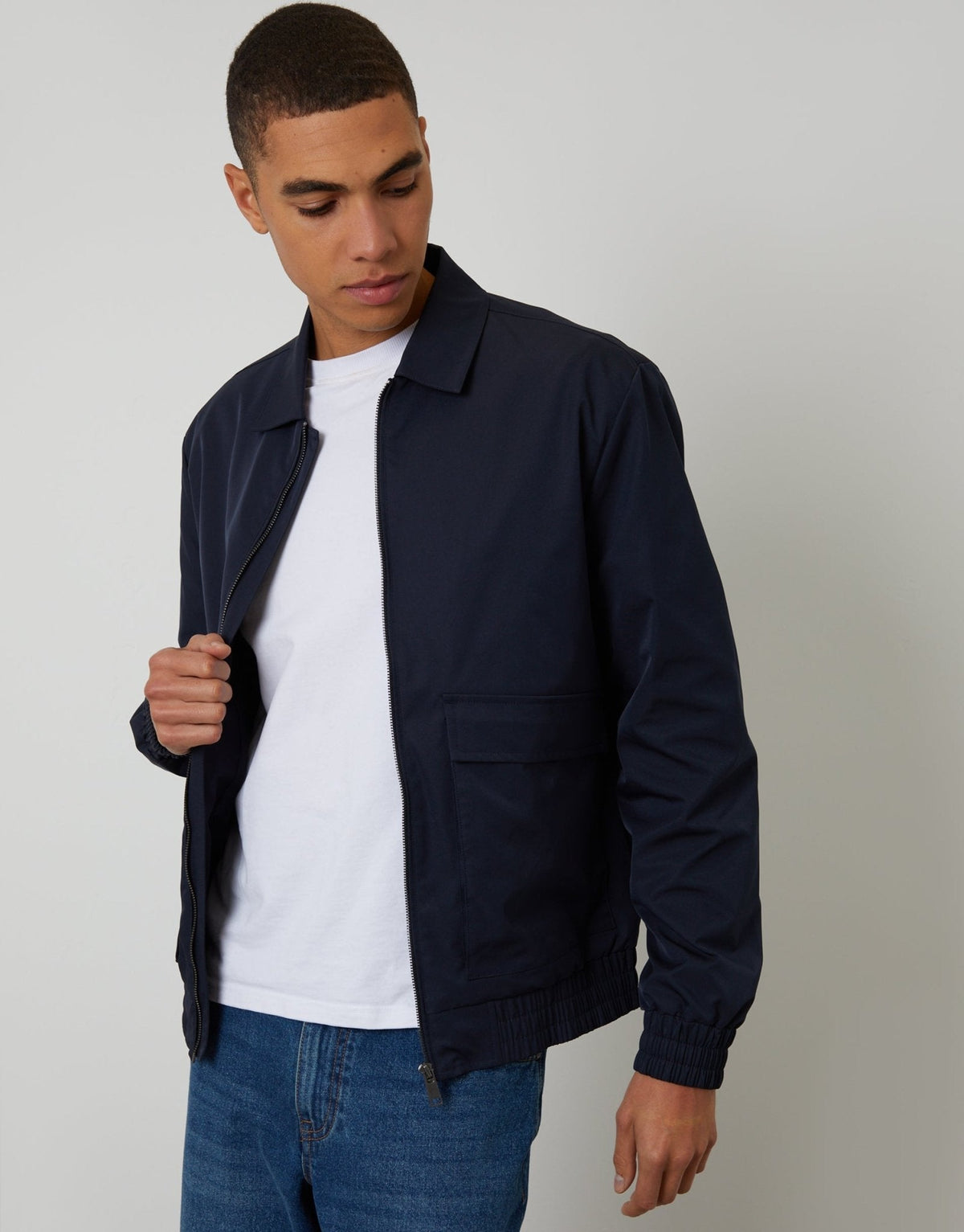 Men's Showerproof Patch Pocket Zip Up Collared Jacket in Navy | SATRI