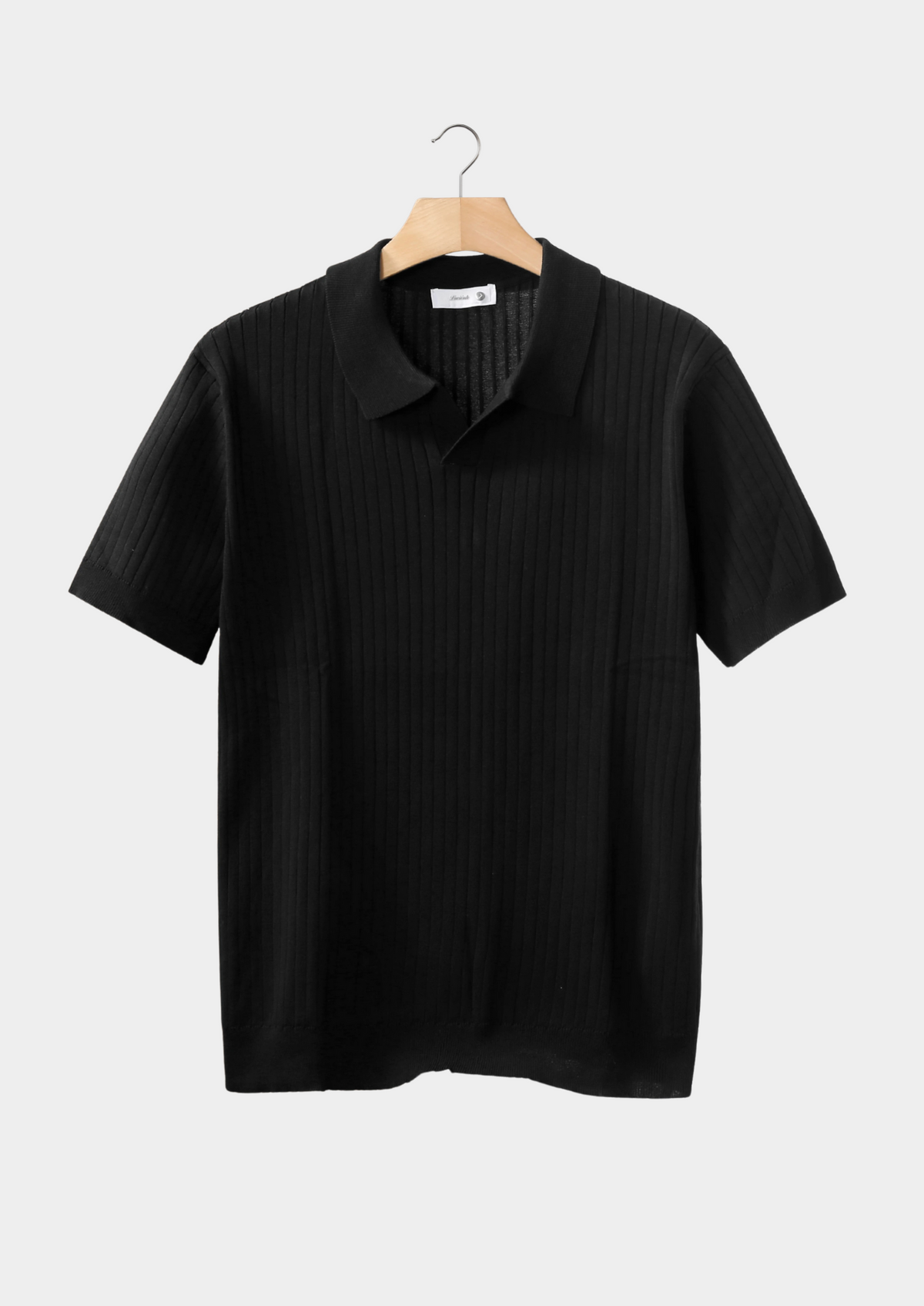 Black Ribbed Buttonless Polo by SATRI & CO. – product view 1