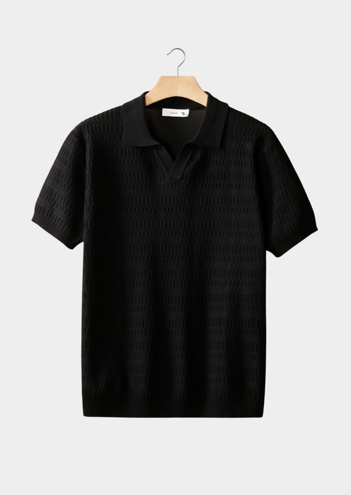 Black Patterned Knit Buttonless Polo by SATRI & CO. – product view 1
